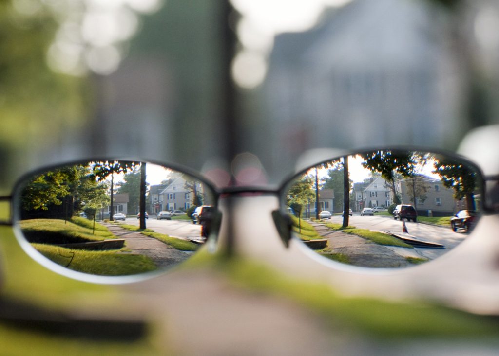 Blurry background fixed by wearing glasses, shows how nearsightedness or myopia works