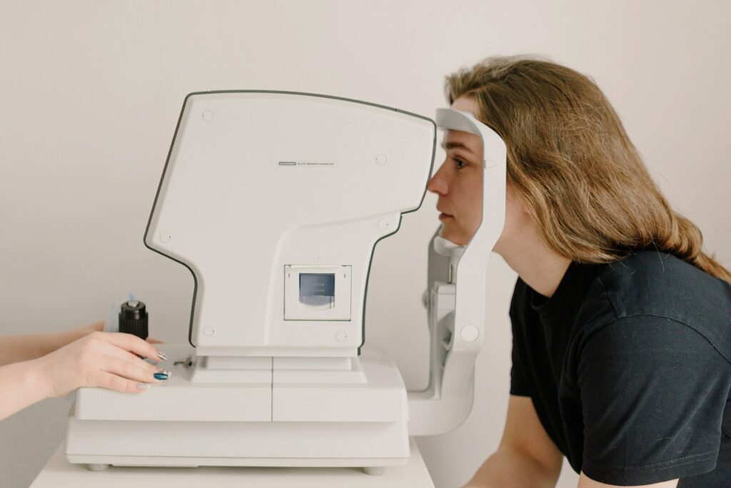 woman undergoing eye exam